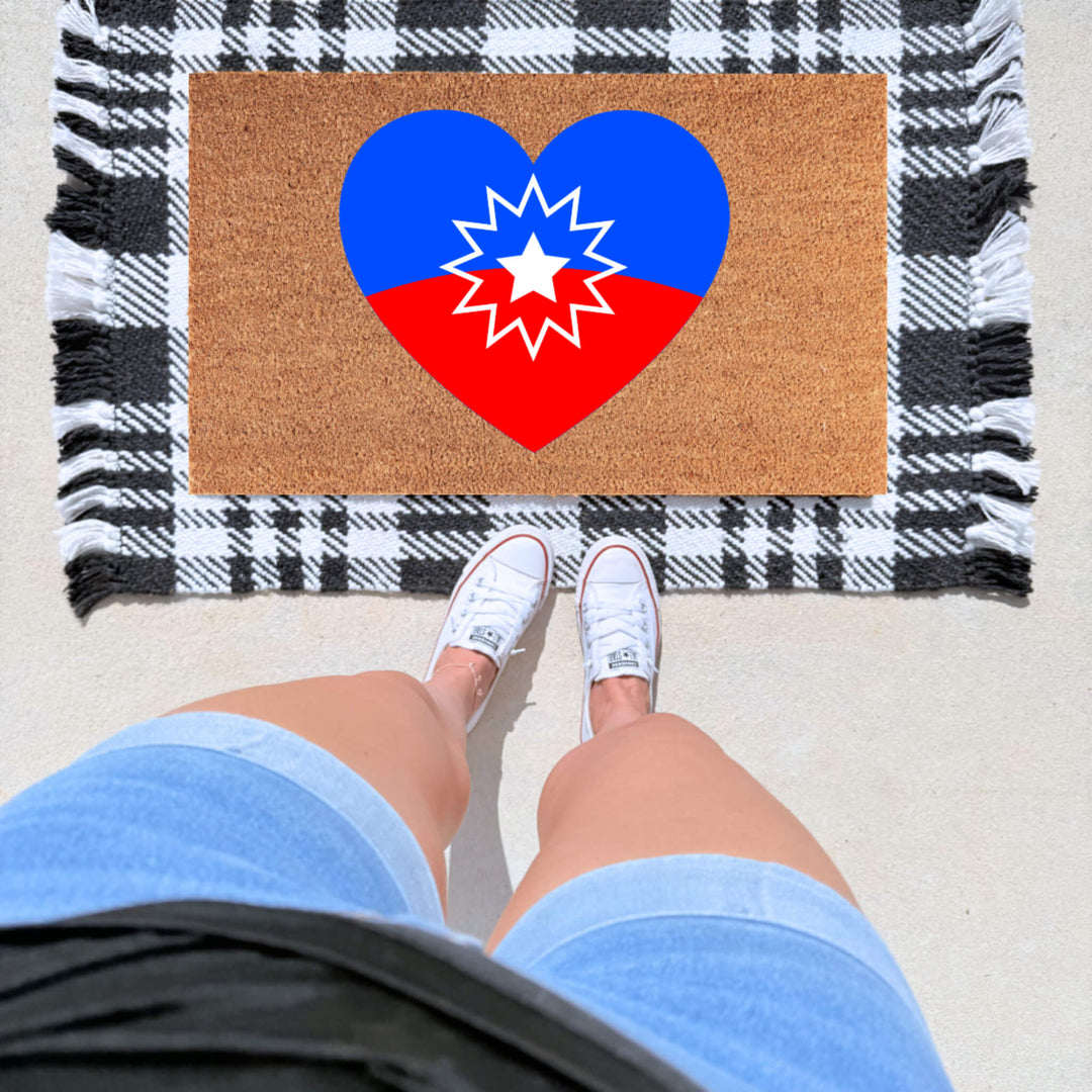 Juneteenth Flag doormat featuring the official Freedom Day flag design with a white star, red and blue colors on a natural coir welcome mat.