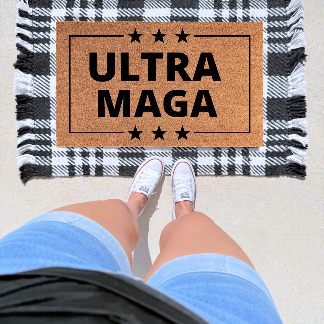 Ultra MAGA patriotic conservative doormat with bold black lettering and stars printed on a natural coir welcome mat.